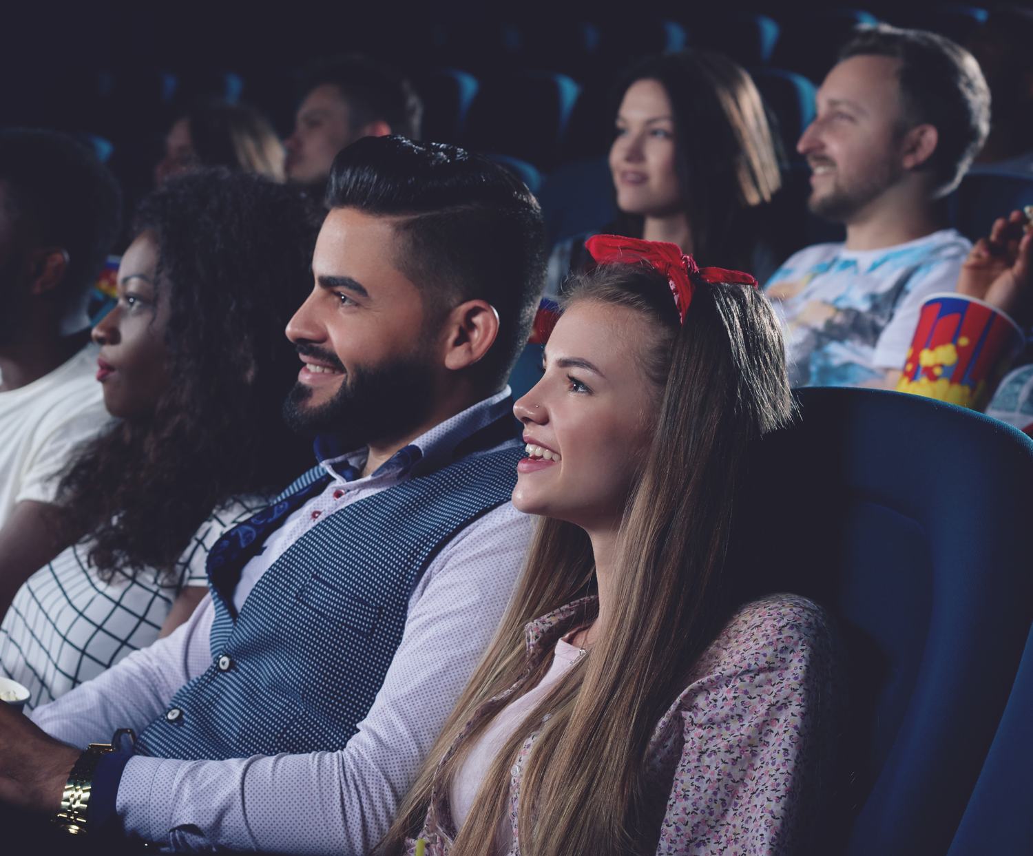 A cinema audience watching a film